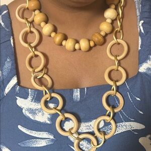 Source Unknown Wooden and Gold-Tone Necklace

2 pieces